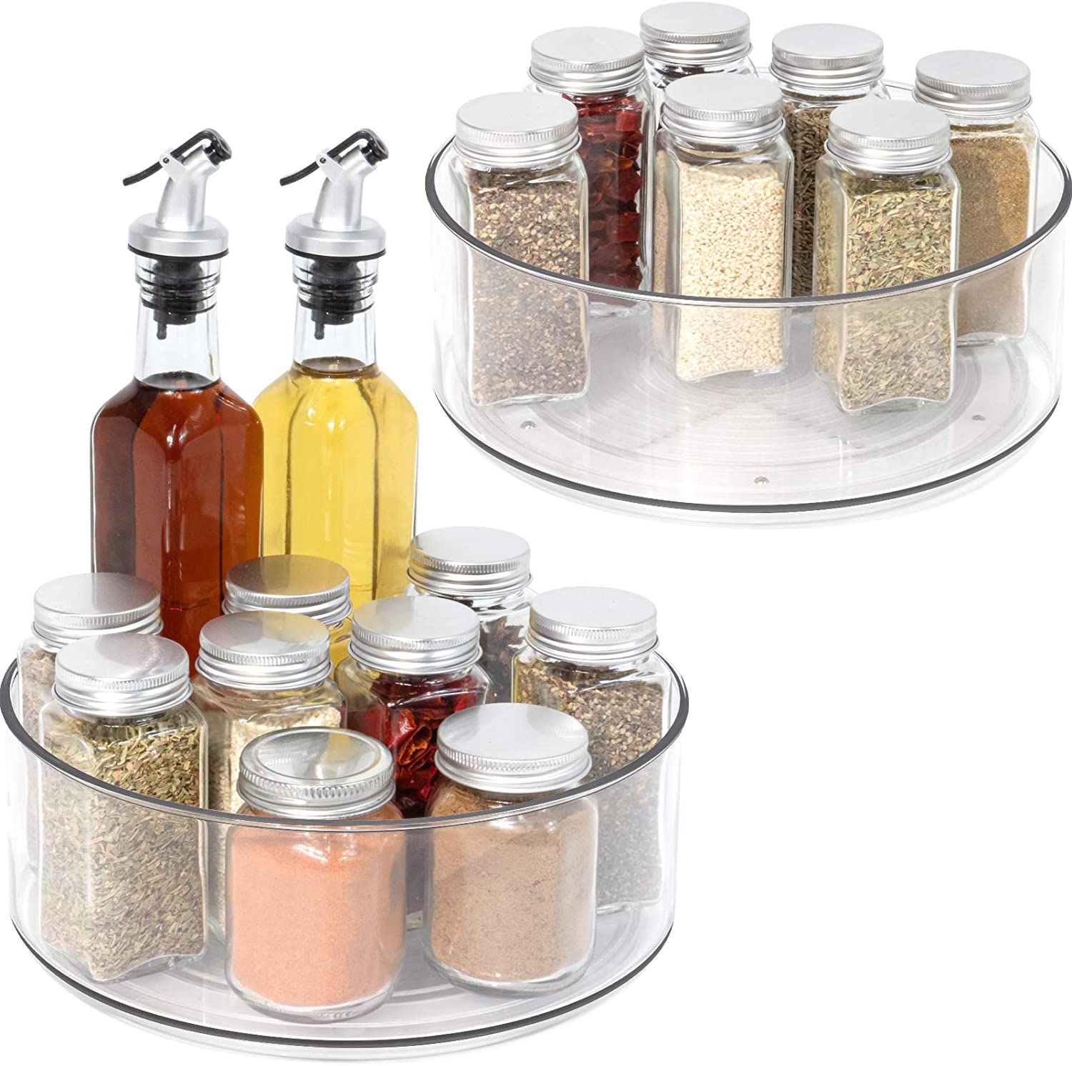 厨房组织理念-两个透明的丙烯酸懒洋洋的苏珊组织者各种香料和油。