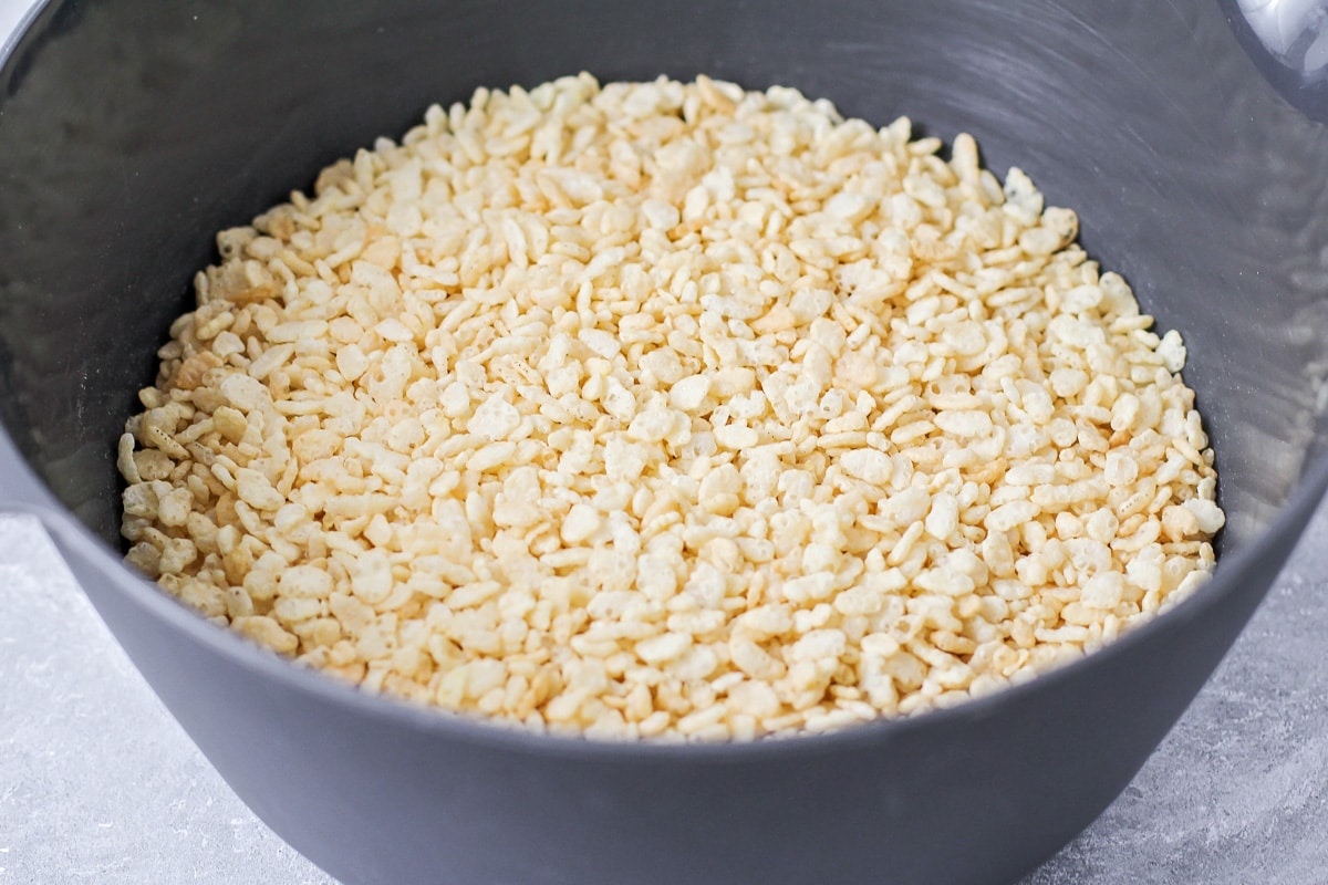 Rice krispies in a bowl for making scotcheroos.