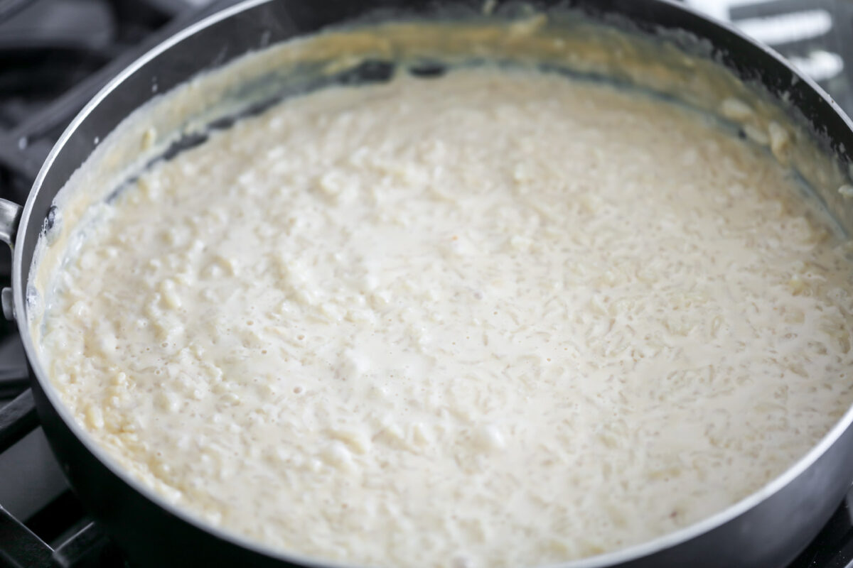Rice boiling in pan for Arroz con leche.